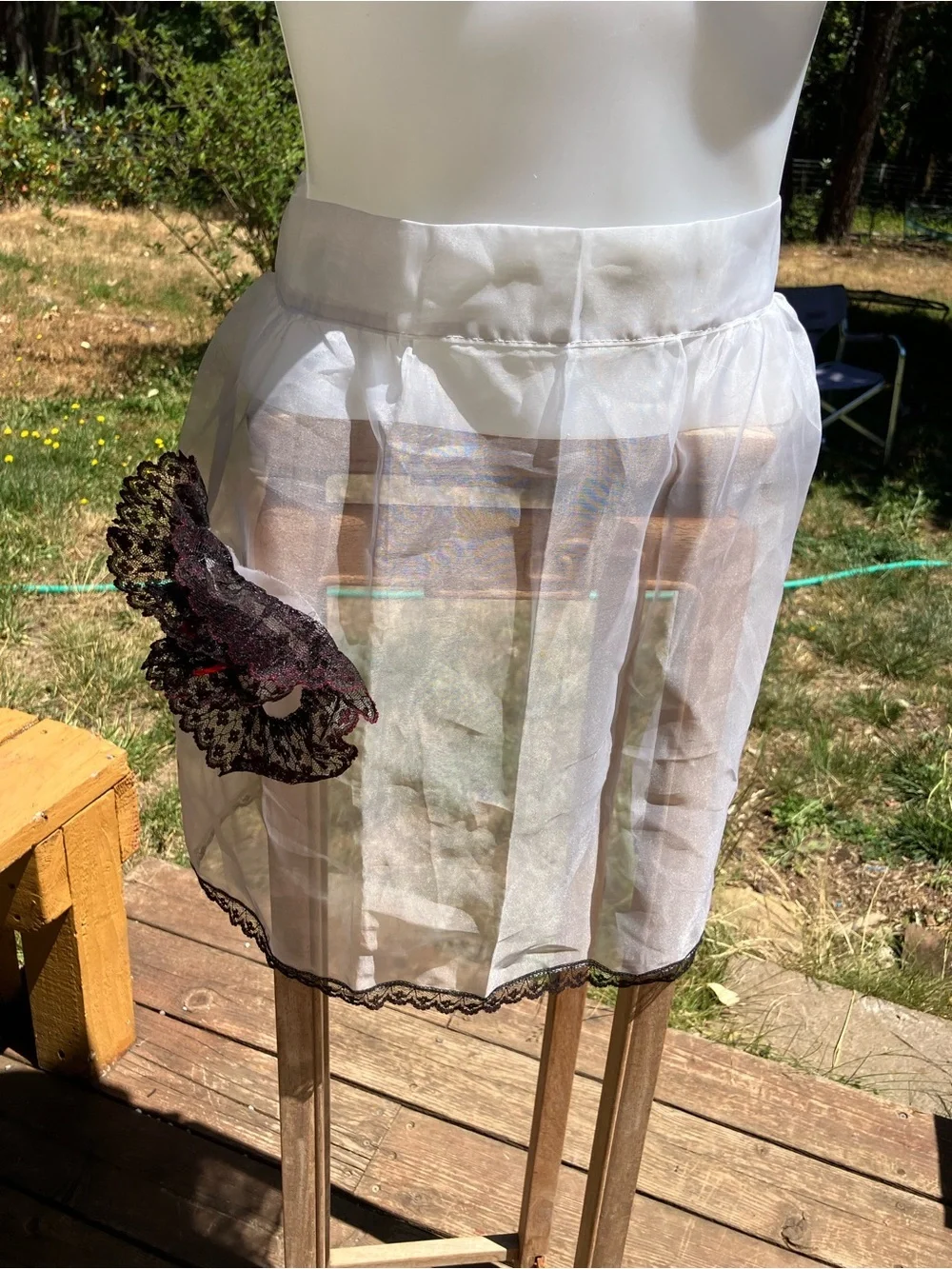 Vintage sheer apron with black and red lace pocket